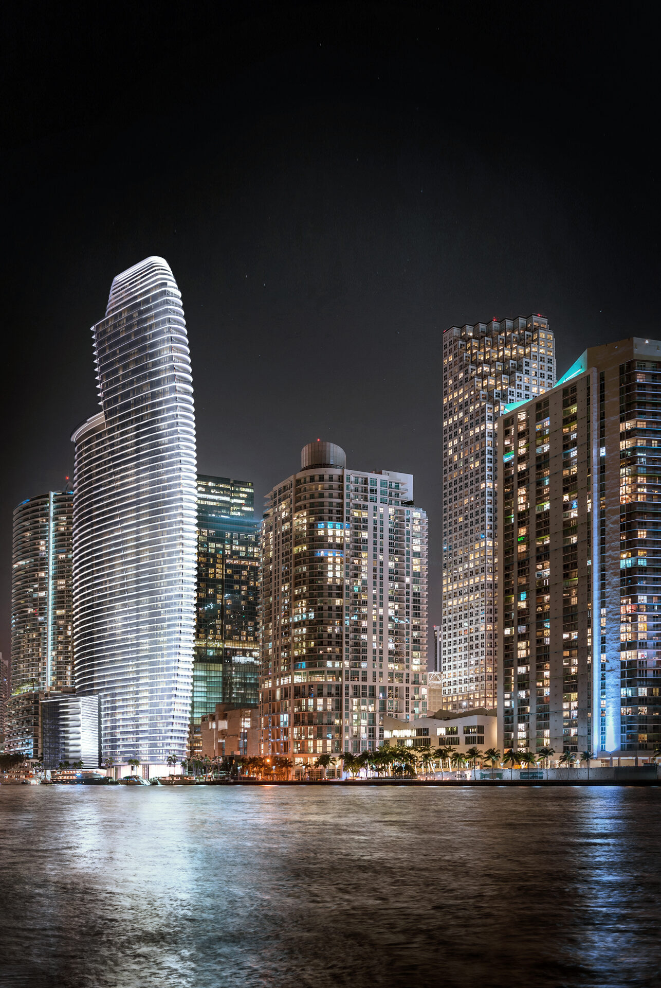 Aston Martin Residences illuminated at night